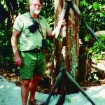George Craig, posed beside a New Guinea native totem in 1995, began in 1951 at the age of 21 to hunt crocodiles in Australia’s northern territory on the island of New Guinea. His expeditions up the Fly River took him as far as 400 miles into the interior of one of the least explored lands on earth.